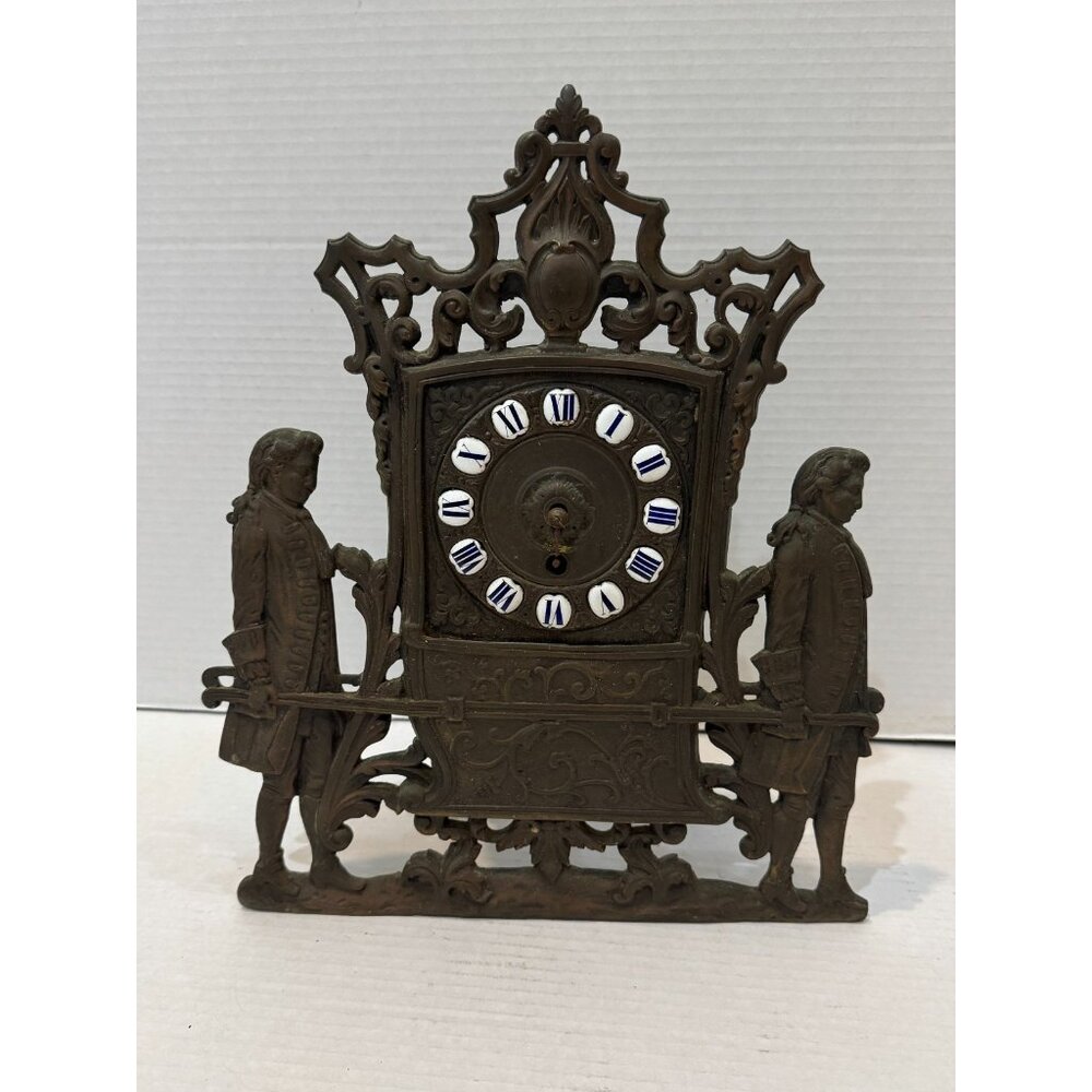 Antique Metal Figural Mantle Clock